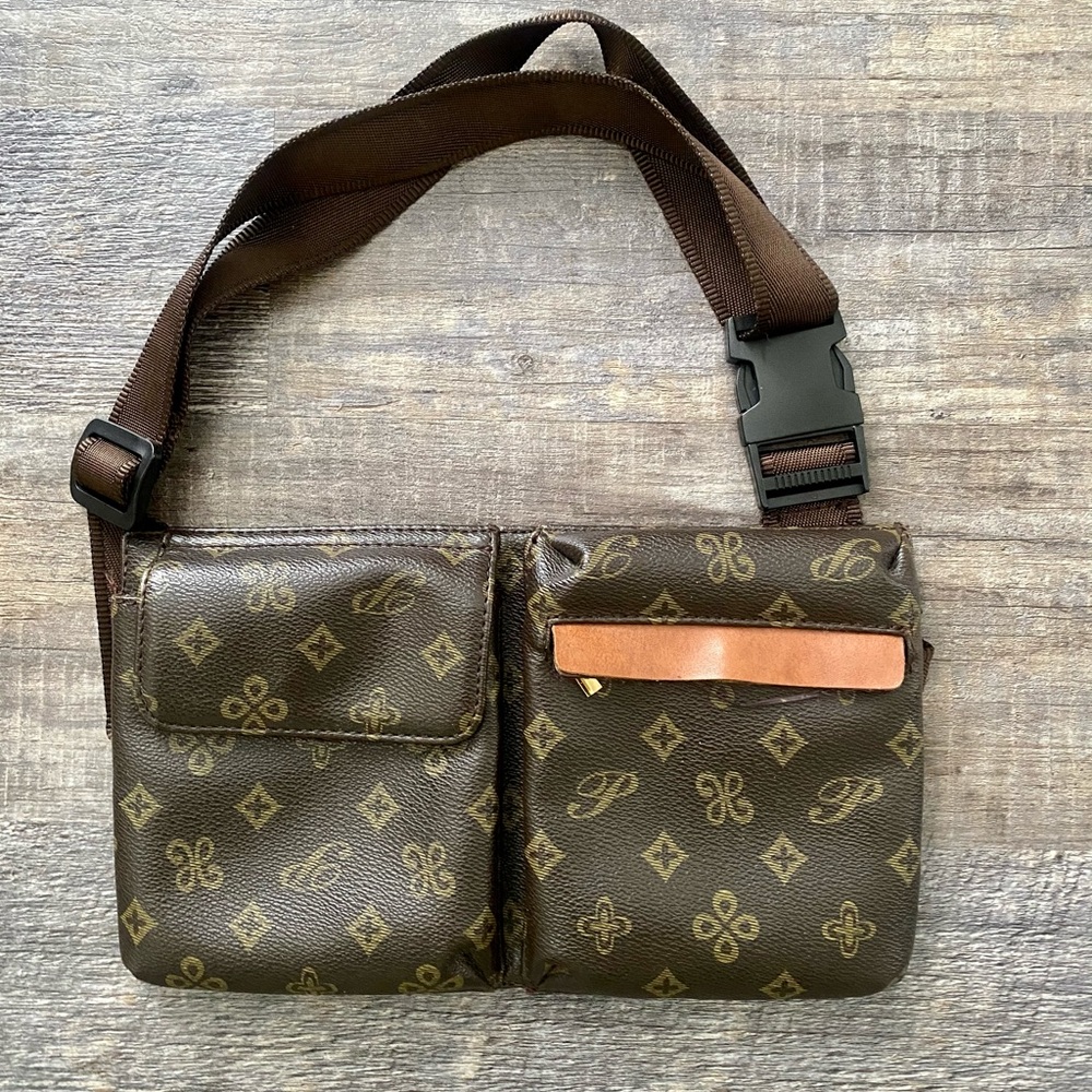 Used Fanny pack 6 inches wide by 10 inches long